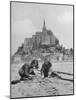 American Travelers Building a Sand Replica of France's Medieval Abbey at Mont Saint Michel-Yale Joel-Mounted Photographic Print