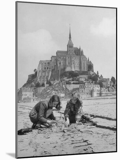 American Travelers Building a Sand Replica of France's Medieval Abbey at Mont Saint Michel-Yale Joel-Mounted Photographic Print