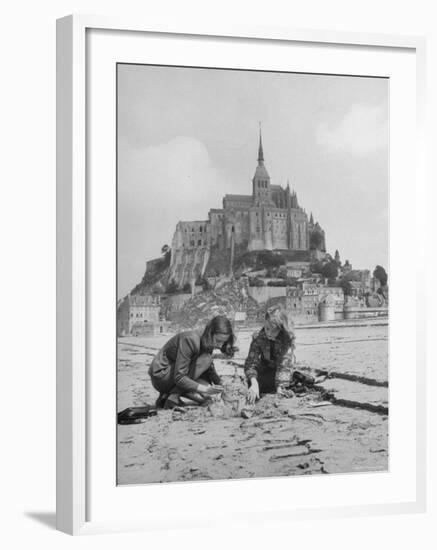 American Travelers Building a Sand Replica of France's Medieval Abbey at Mont Saint Michel-Yale Joel-Framed Photographic Print