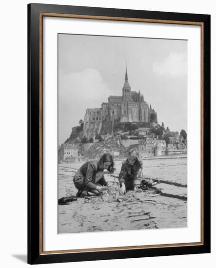 American Travelers Building a Sand Replica of France's Medieval Abbey at Mont Saint Michel-Yale Joel-Framed Photographic Print