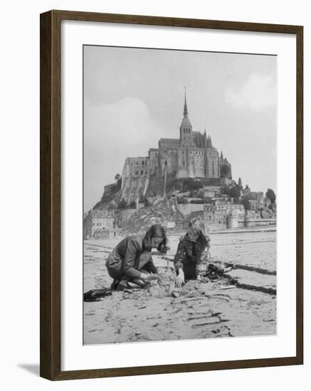 American Travelers Building a Sand Replica of France's Medieval Abbey at Mont Saint Michel-Yale Joel-Framed Photographic Print