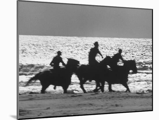 American Visitors Enoying Horseback Riding on Rosarita Beach-Allan Grant-Mounted Photographic Print