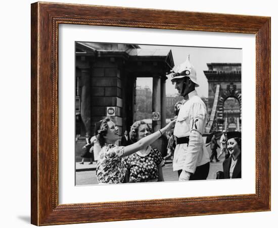 American Women Mobbing a Policeman on Traffic Duty at the Chain Bridge-null-Framed Photographic Print