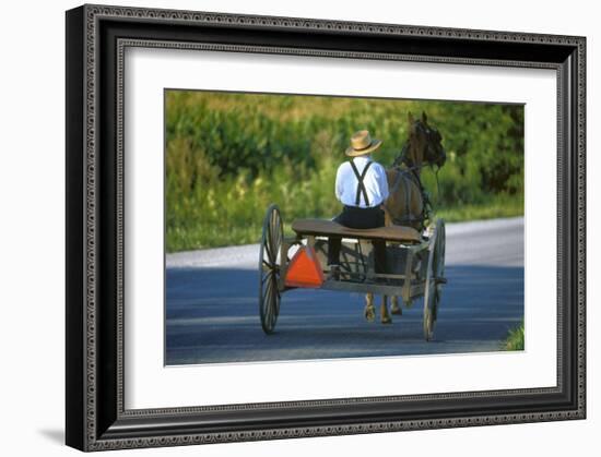 Amish driving a horse-drawn cart, Pennsylvania, USA-null-Framed Art Print