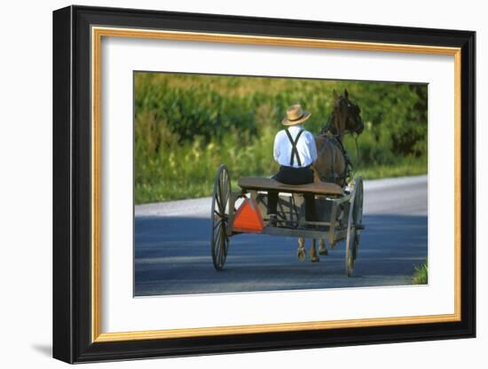 Amish driving a horse-drawn cart, Pennsylvania, USA-null-Framed Art Print