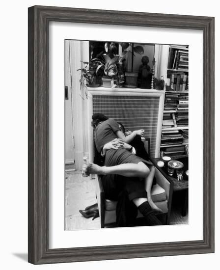 Amorous Couple Wrapped Up with Each Other During a Cocktail Party at a Private Home-Francis Miller-Framed Photographic Print