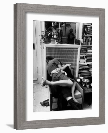 Amorous Couple Wrapped Up with Each Other During a Cocktail Party at a Private Home-Francis Miller-Framed Photographic Print