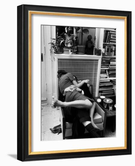 Amorous Couple Wrapped Up with Each Other During a Cocktail Party at a Private Home-Francis Miller-Framed Photographic Print