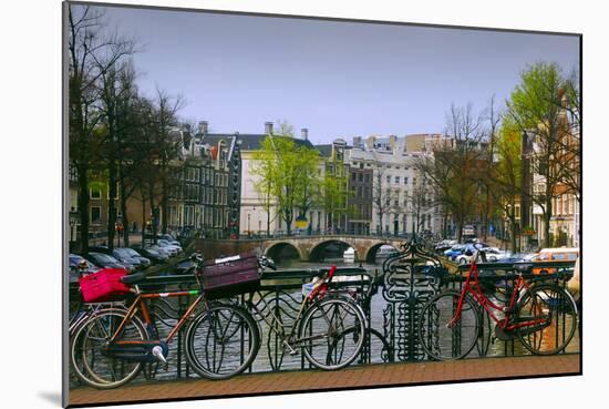 Amsterdam Bicycles on Brige over Canal-Anna Miller-Mounted Photographic Print
