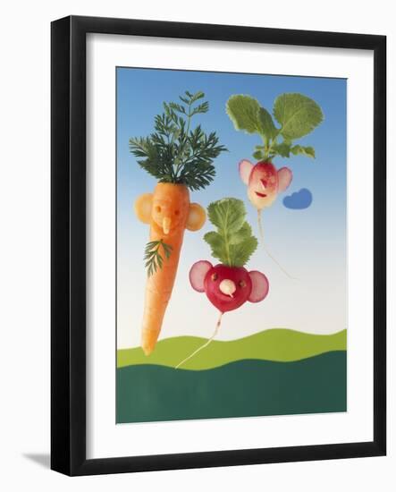 Amusing Carrot and Radish Figures-Ulrich Kerth-Framed Photographic Print