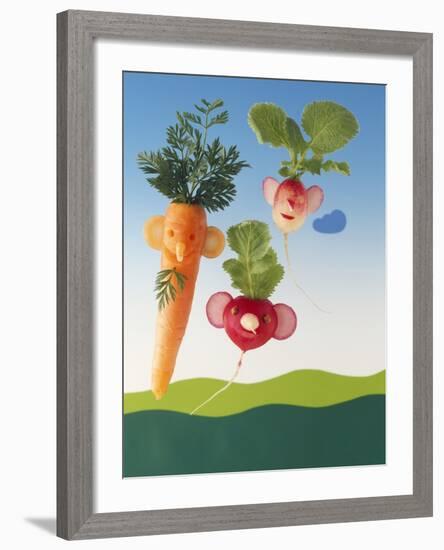 Amusing Carrot and Radish Figures-Ulrich Kerth-Framed Photographic Print