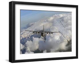 An AC-130U Gunship Jettisons Flares Over Florida-Stocktrek Images-Framed Photographic Print