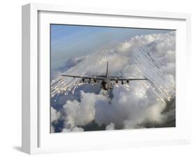 An AC-130U Gunship Jettisons Flares Over Florida-Stocktrek Images-Framed Photographic Print