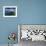 An Aerial View of a Boat as it Speeds Through the Rock Islands, Republic of Palau.-Ian Shive-Framed Photographic Print displayed on a wall