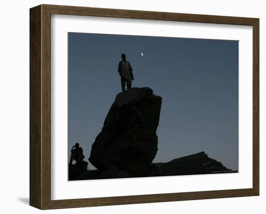 An Afghan Man Stands on a Huge Rock Next to the Now Abad Dinazung Monument-Rodrigo Abd-Framed Photographic Print