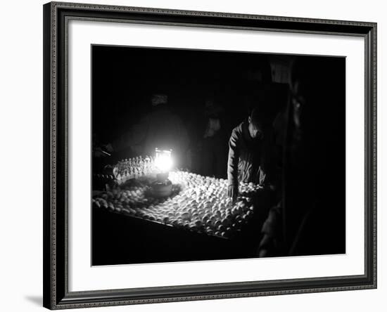An Afghan Vendor Sells Eggs by Lantern Light-null-Framed Photographic Print