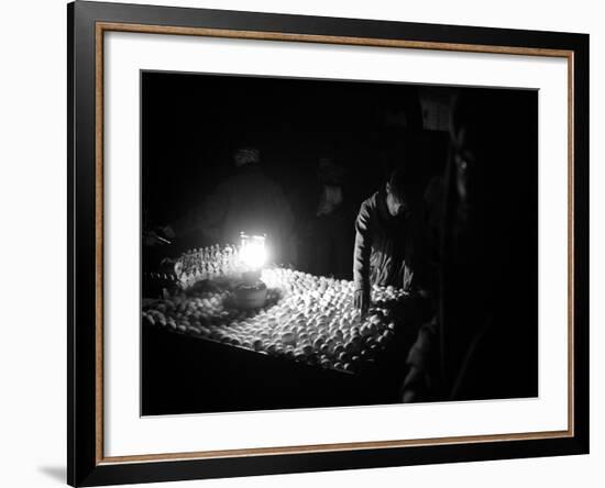 An Afghan Vendor Sells Eggs by Lantern Light-null-Framed Photographic Print