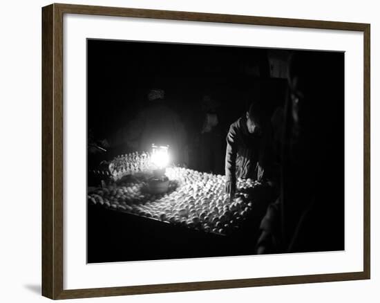 An Afghan Vendor Sells Eggs by Lantern Light-null-Framed Photographic Print