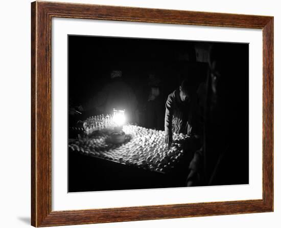 An Afghan Vendor Sells Eggs by Lantern Light-null-Framed Photographic Print