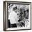 An African American Pokes His Finger into a Bullet Hole in the Oakland Black Panther's Headquarters-null-Framed Photo