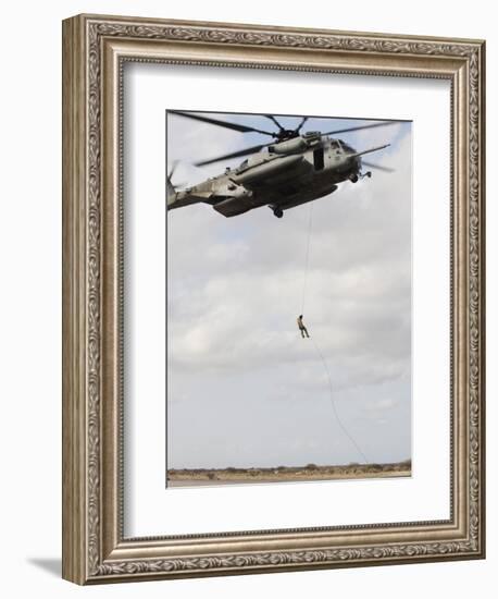 An Air Force Pararescueman Conducts a Combat Insertion and Extraction Exercise in Djibouti, Africa-null-Framed Photographic Print