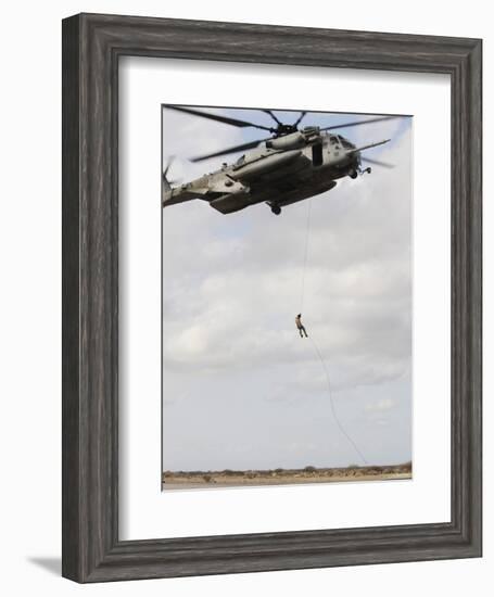 An Air Force Pararescueman Conducts a Combat Insertion and Extraction Exercise in Djibouti, Africa-null-Framed Photographic Print