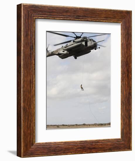 An Air Force Pararescueman Conducts a Combat Insertion and Extraction Exercise in Djibouti, Africa-null-Framed Photographic Print