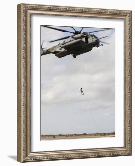 An Air Force Pararescueman Conducts a Combat Insertion and Extraction Exercise in Djibouti, Africa-null-Framed Photographic Print