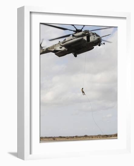 An Air Force Pararescueman Conducts a Combat Insertion and Extraction Exercise in Djibouti, Africa-null-Framed Photographic Print