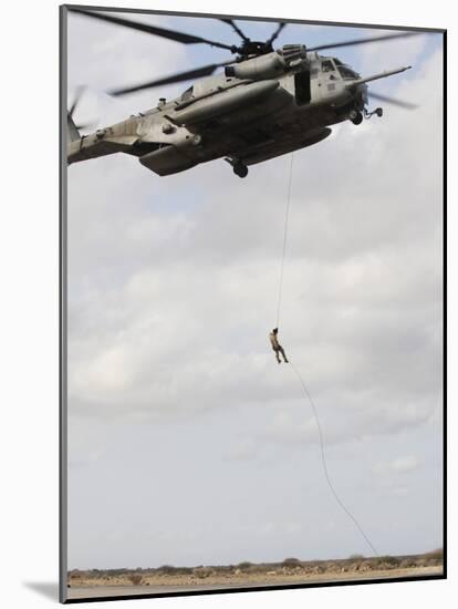 An Air Force Pararescueman Conducts a Combat Insertion and Extraction Exercise in Djibouti, Africa-null-Mounted Photographic Print