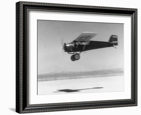 An Airplane in Flight, Speed-Blurred-J^ R^ Eyerman-Framed Photographic Print