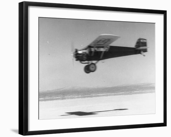 An Airplane in Flight, Speed-Blurred-J^ R^ Eyerman-Framed Photographic Print