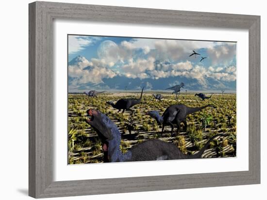 An Allosaurus Attacking a Herd of Camptosaurus Dinosaurs-null-Framed Premium Giclee Print