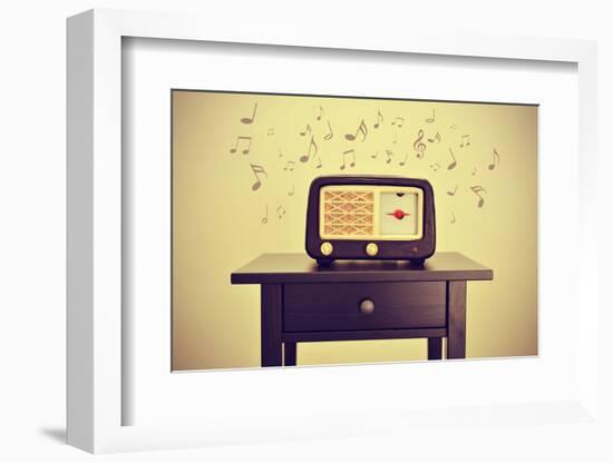 An Antique Radio Receptor on a Desk and Musical Notes, with a Retro Effect-nito-Framed Photographic Print