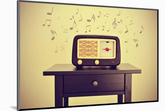 An Antique Radio Receptor on a Desk and Musical Notes, with a Retro Effect-nito-Mounted Photographic Print