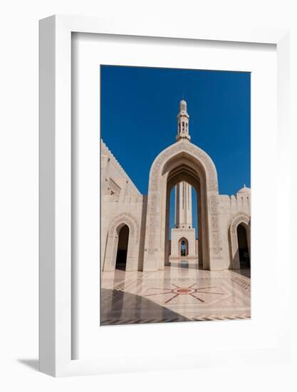 An archway leading to a minaret in Sultan Qaboos Grand Mosque, Muscat, Oman.-Sergio Pitamitz-Framed Photographic Print