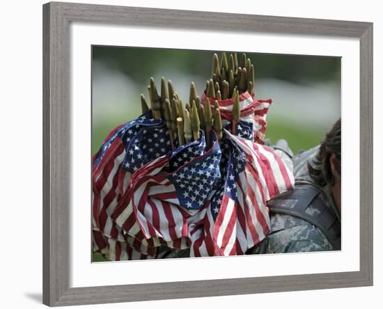 An Army Soldier's Backpack Overflows with Small American Flags-Stocktrek Images-Framed Photographic Print