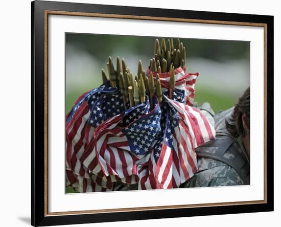 An Army Soldier's Backpack Overflows with Small American Flags-Stocktrek Images-Framed Photographic Print