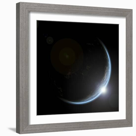 An Artist's Depiction of Sunrise over a Planet Viewed from Space-null-Framed Art Print