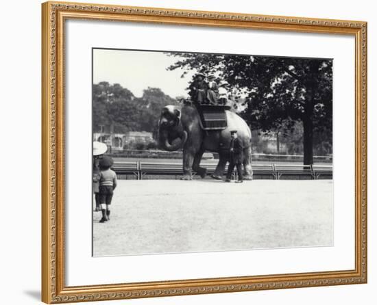 An Asian Elephant Being Ridden by Two Ladies and a Young Girl-Frederick William Bond-Framed Photographic Print