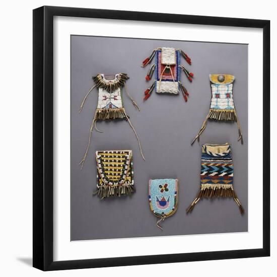 An Assortment of Kiowa, Sioux, Cheyenne, Crow, and Apache Beaded Hide Belt Pouches-null-Framed Giclee Print