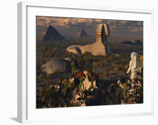 An Astronaut Explorer Comes across Familiar Structures on an Alien Landscape-Stocktrek Images-Framed Photographic Print