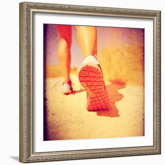 An Athletic Pair of Legs Running or Jogging on a Path during Summer Toned with a Soft Vintage Insta-graphicphoto-Framed Photographic Print