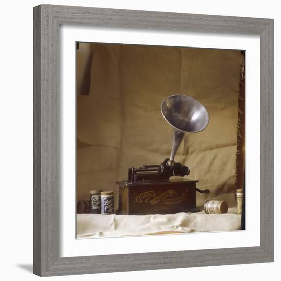 An Early Edison Phonograph Using Grooved Wax Cylinders Shown Beside the Instrument-null-Framed Photographic Print