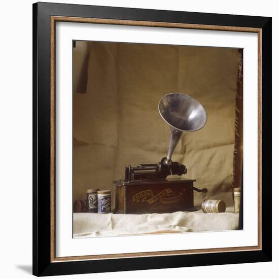 An Early Edison Phonograph Using Grooved Wax Cylinders Shown Beside the Instrument-null-Framed Photographic Print