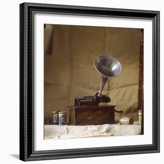 An Early Edison Phonograph Using Grooved Wax Cylinders Shown Beside the Instrument-null-Framed Photographic Print