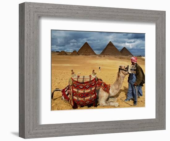 An Egyptian Man Rests His Camel Waiting for Locals and Tourists to Rent It-null-Framed Photographic Print