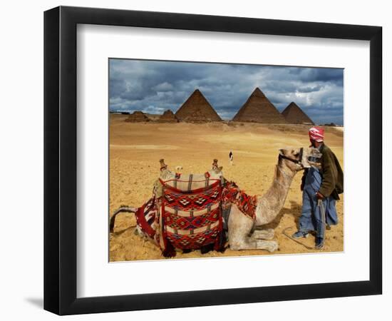 An Egyptian Man Rests His Camel Waiting for Locals and Tourists to Rent It-null-Framed Photographic Print