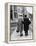 An Elderly Couple Walking Down the Street, Arm in Arm-Henry Grant-Framed Premier Image Canvas