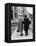 An Elderly Couple Walking Down the Street, Arm in Arm-Henry Grant-Framed Premier Image Canvas